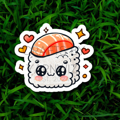 a sticker of a sushi in the grass