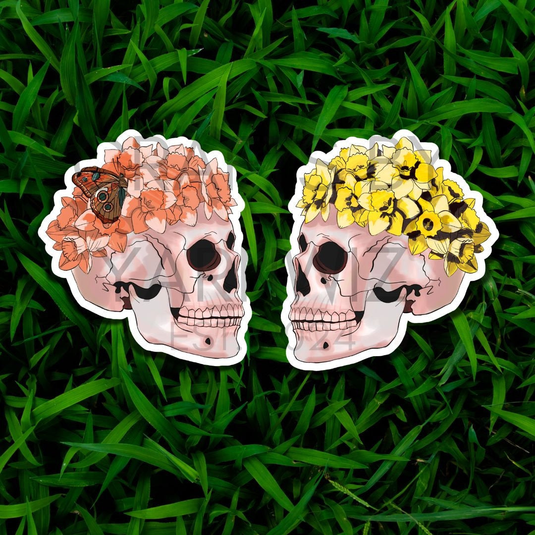 a sticker of a skull with flowers in its hair