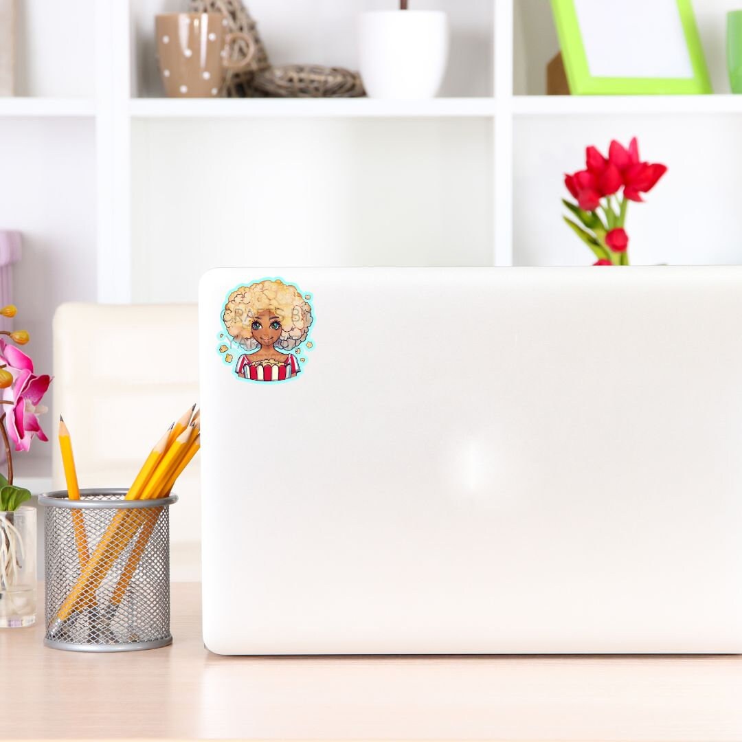 a laptop computer sitting on top of a wooden desk