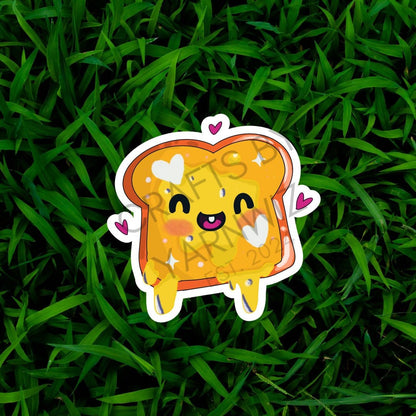 a sticker of a toasted bread with hearts on it