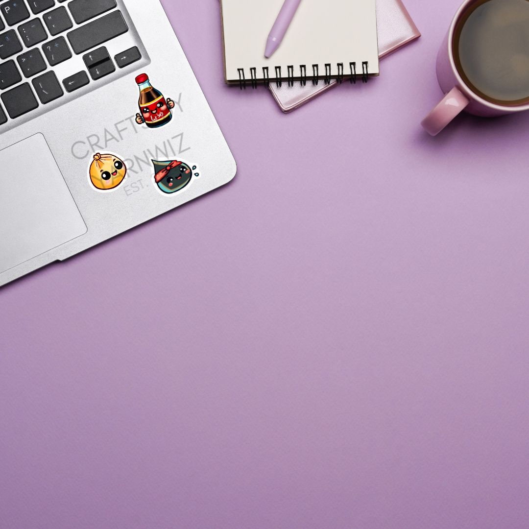 a laptop computer sitting on top of a desk next to a cup of coffee