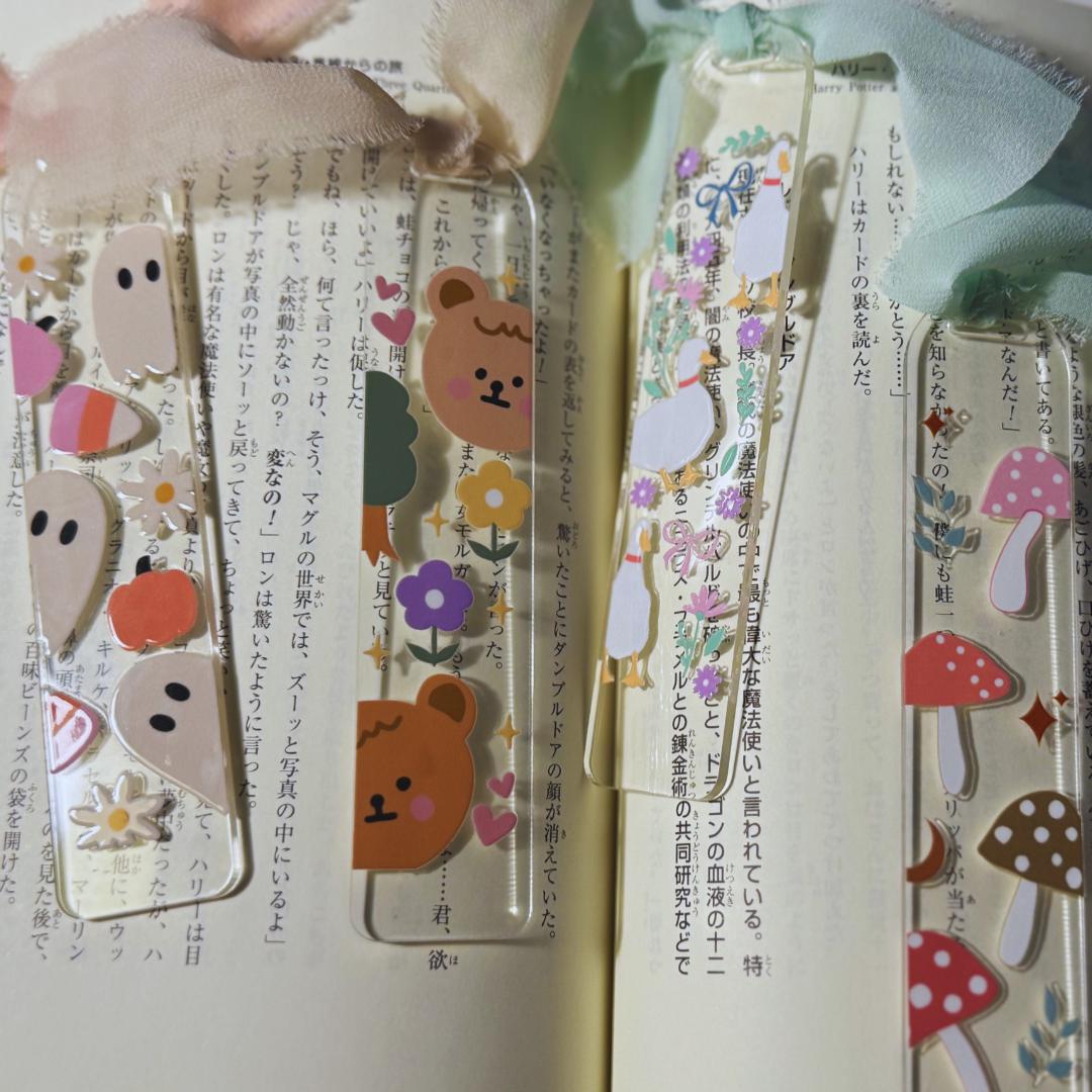 a close up of a book with a bunch of stickers on it