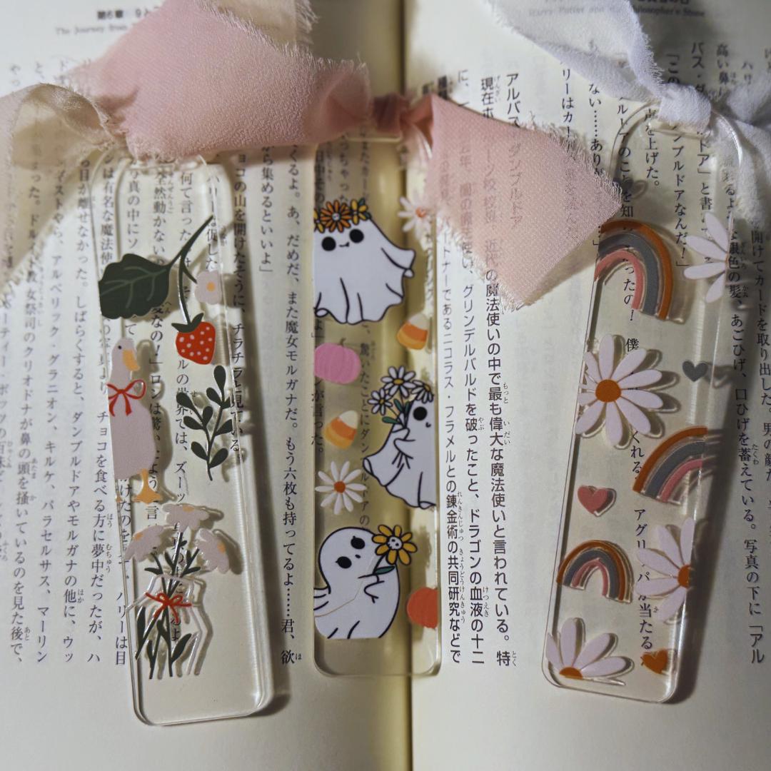 a book with three different bookmarks on it